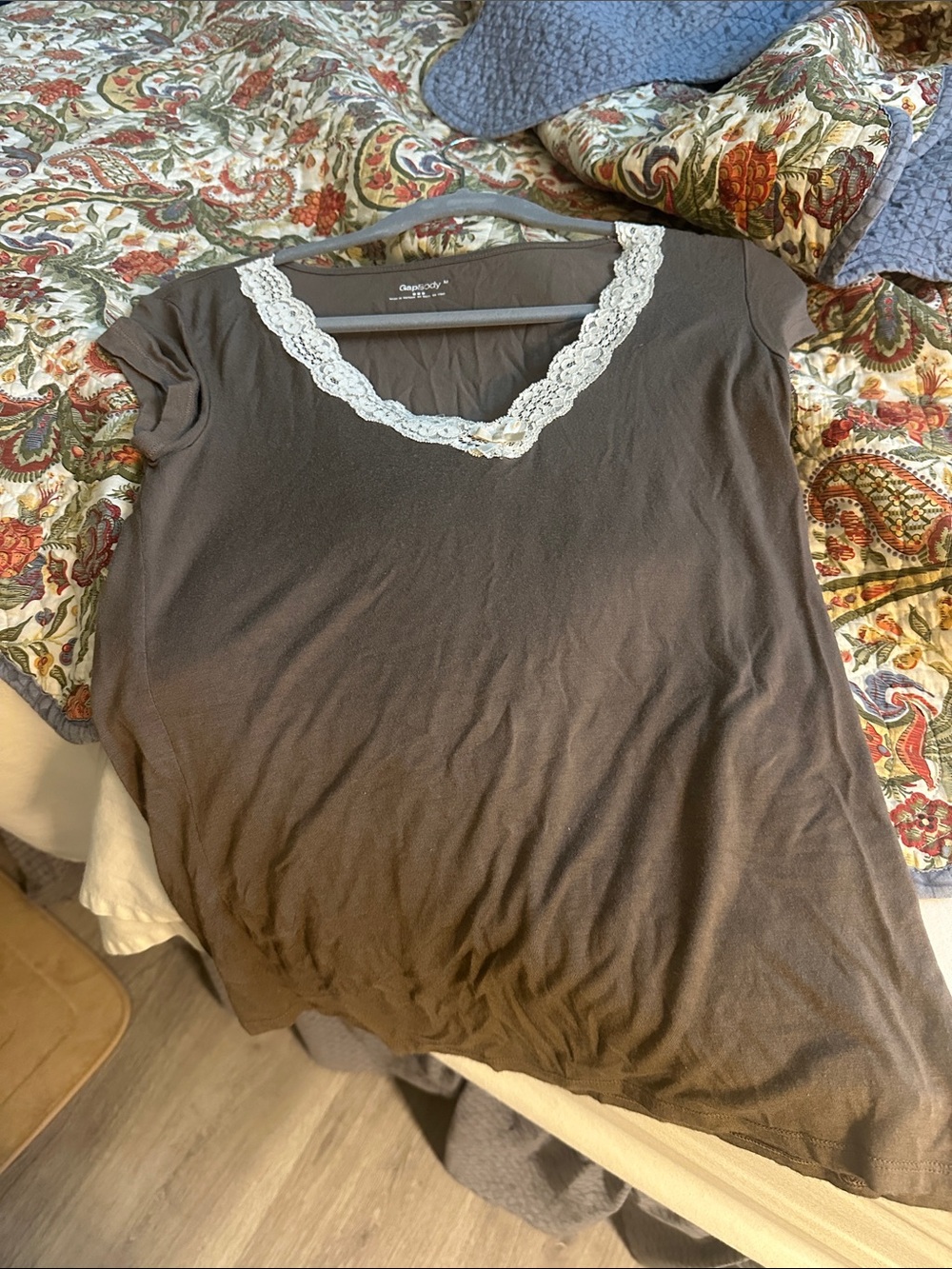 George sleeveless brown camisole with white lace V-neck